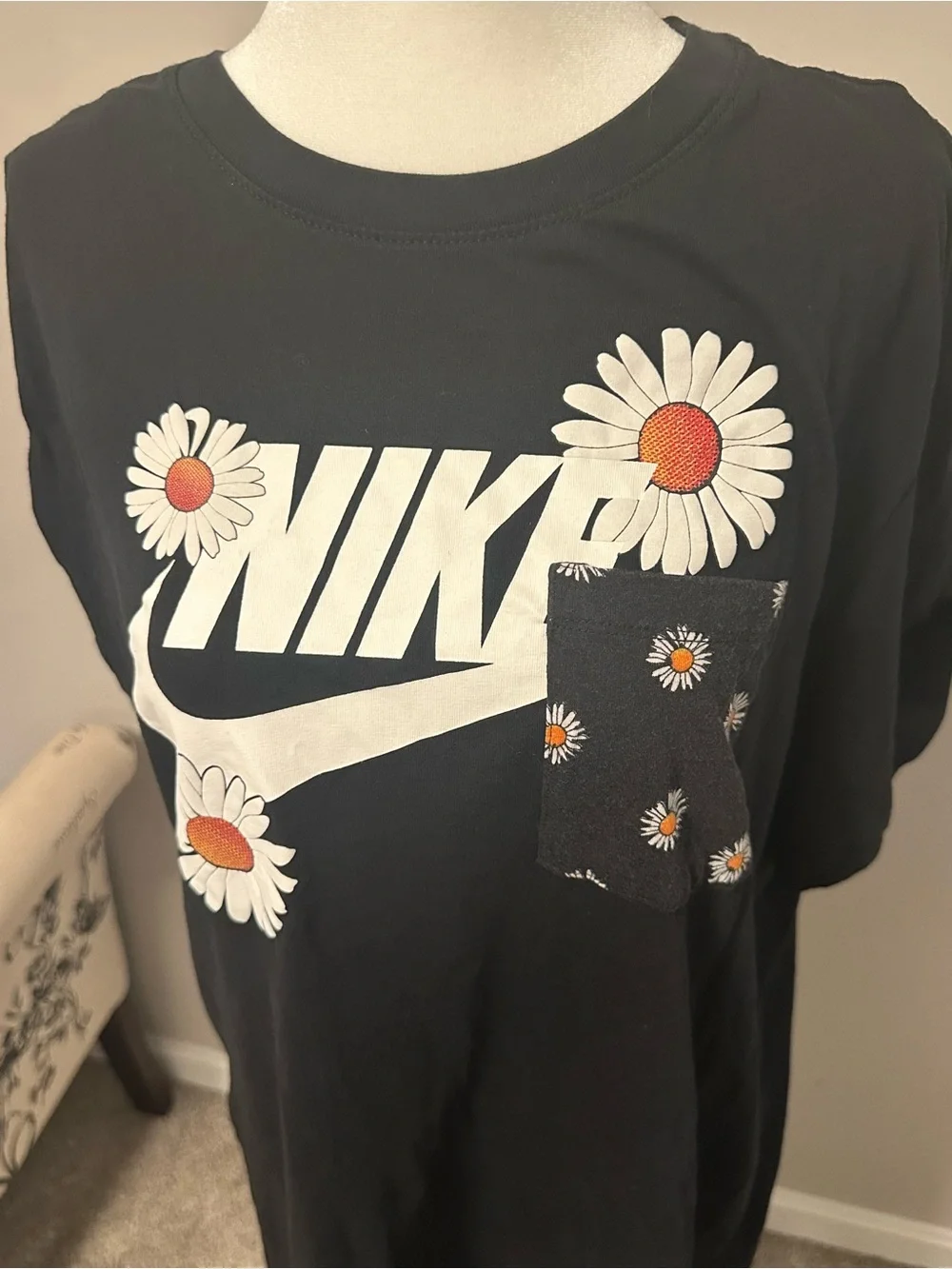 Nike Black Tee with White Logo and Daisy Accents